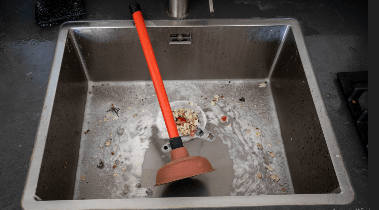 What is Causing My Kitchen Sink To Clog | Lazy Drains